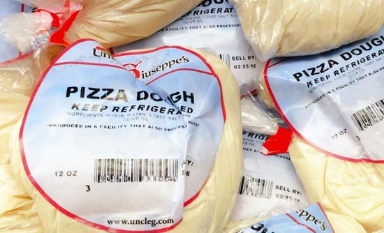 Pizza dough with the Uncle Giuseppe label on it