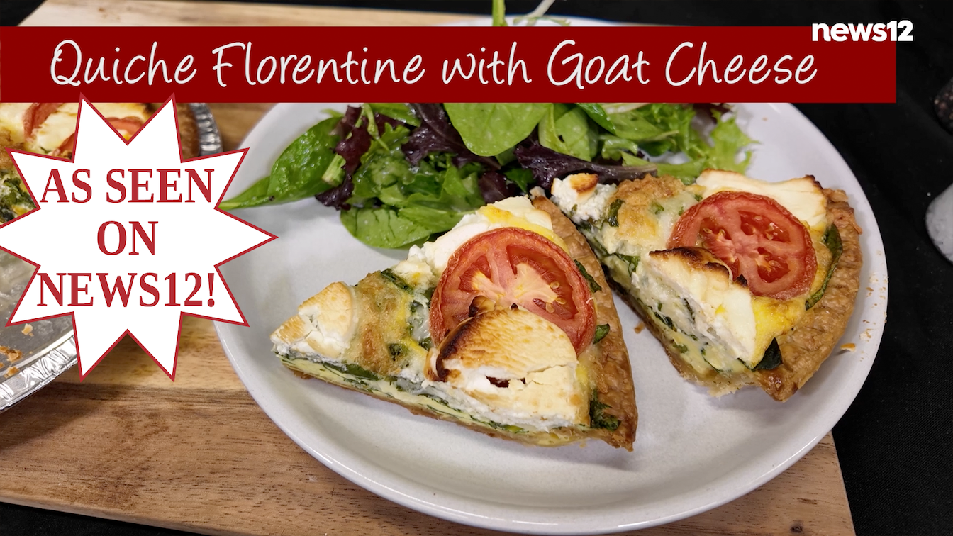 Quiche Florentine slices on a white plate