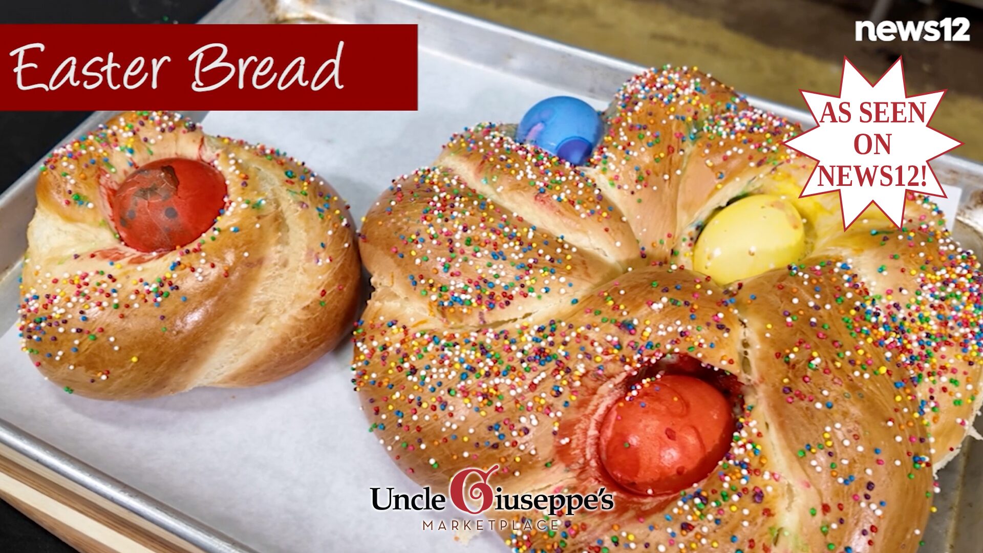 Easter bread with dyed eggs on a baking sheet.