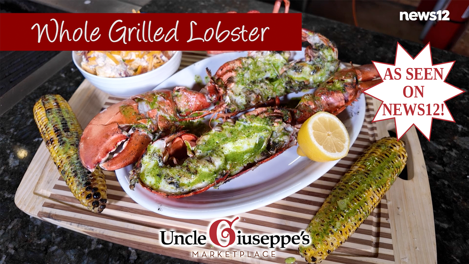Whole grilled lobster and corn on a white plate set on a wood cutting board