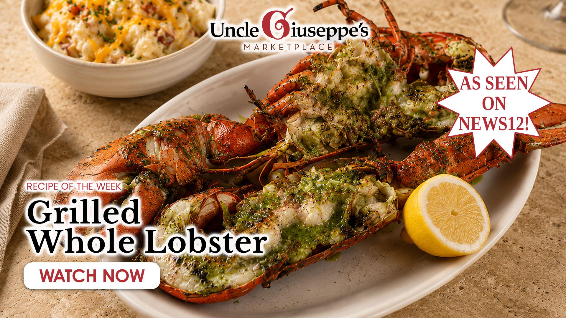 Whole grilled lobster and corn on a white plate set on a wood cutting board