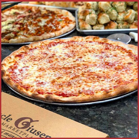 Uncle Giuseppe's cheese pizza with garlic knots