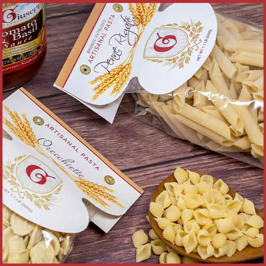 Uncle Giuseppe's artisanal pastas on a wood background