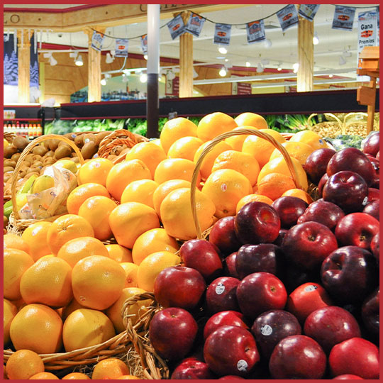 Close up of oranges and apples in Uncle Giuseppe's produce section