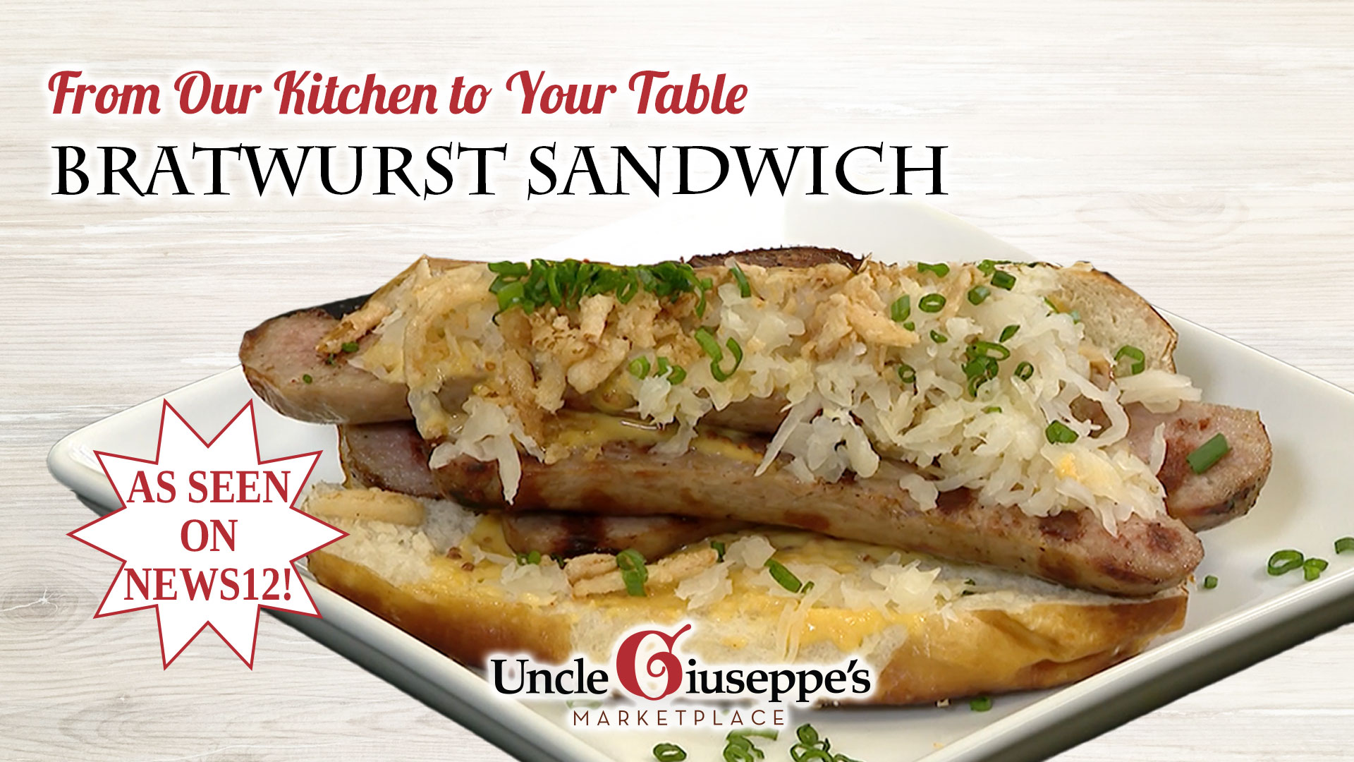 Bratwurst sandwich with sauerkraut on a pretzel bun on a white plate