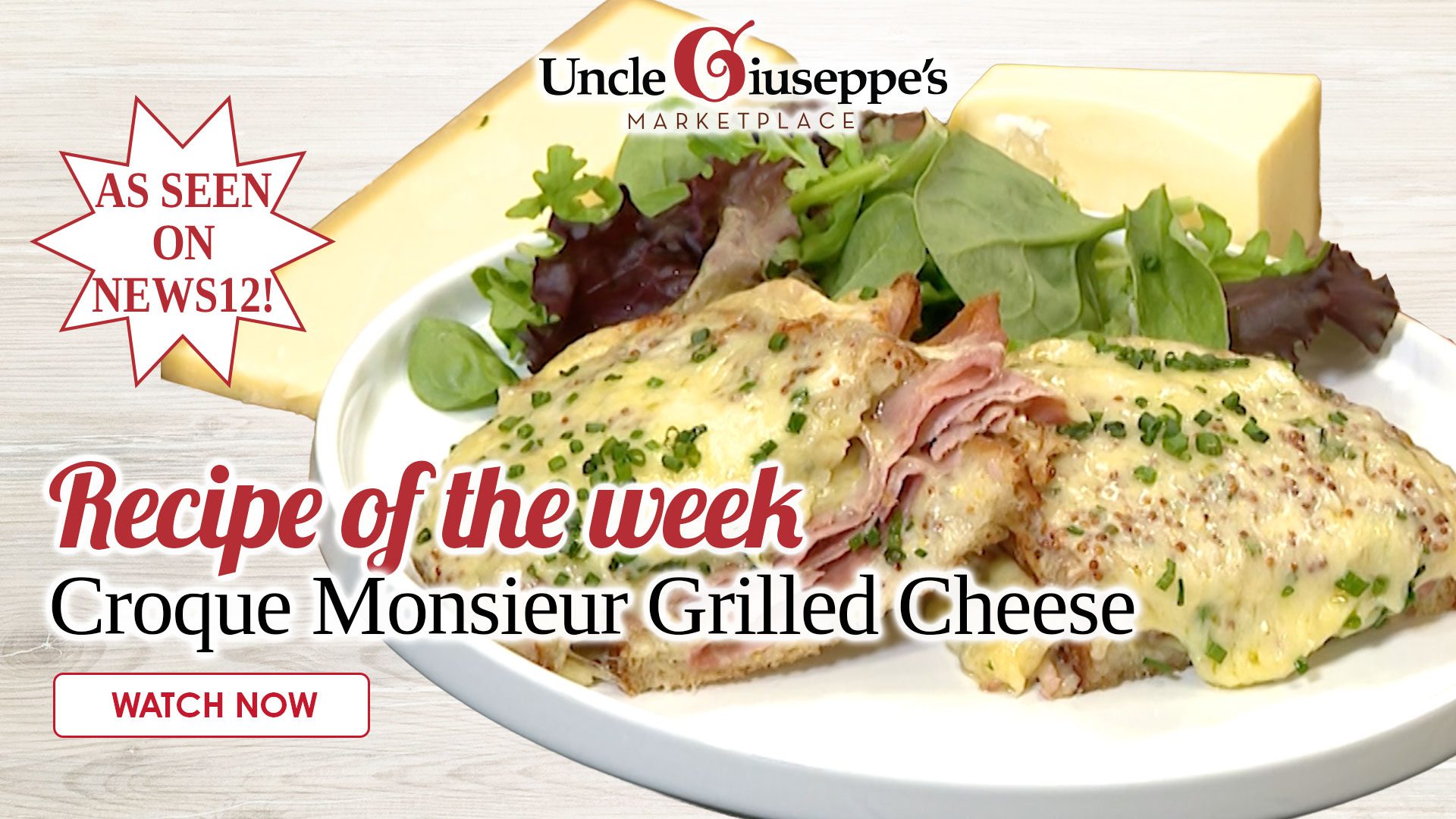 Croque monsieur grilled cheese on a white plate