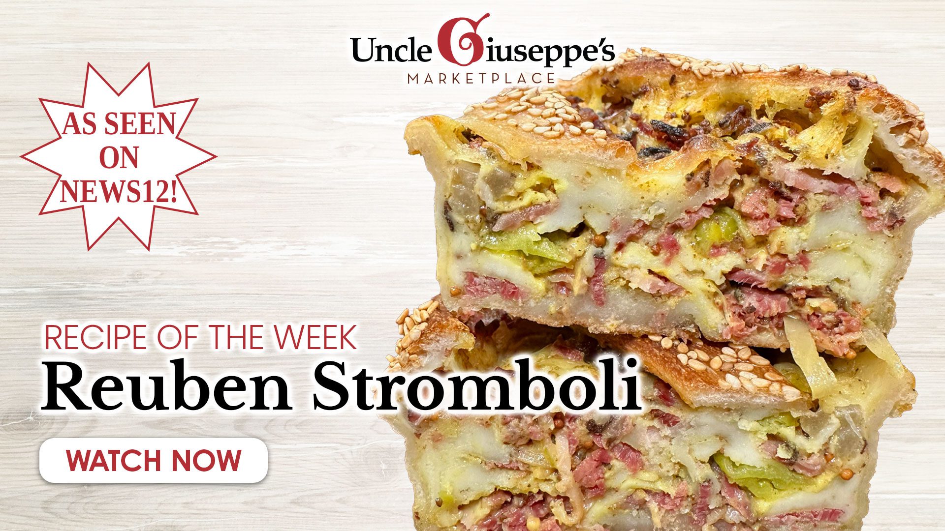 Reuben Stromboli cut in half on white wood